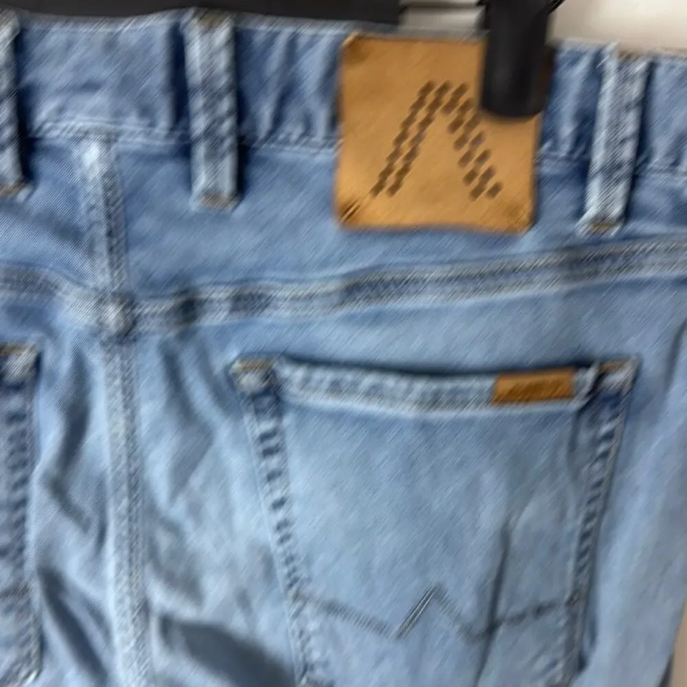 Alberto gently used